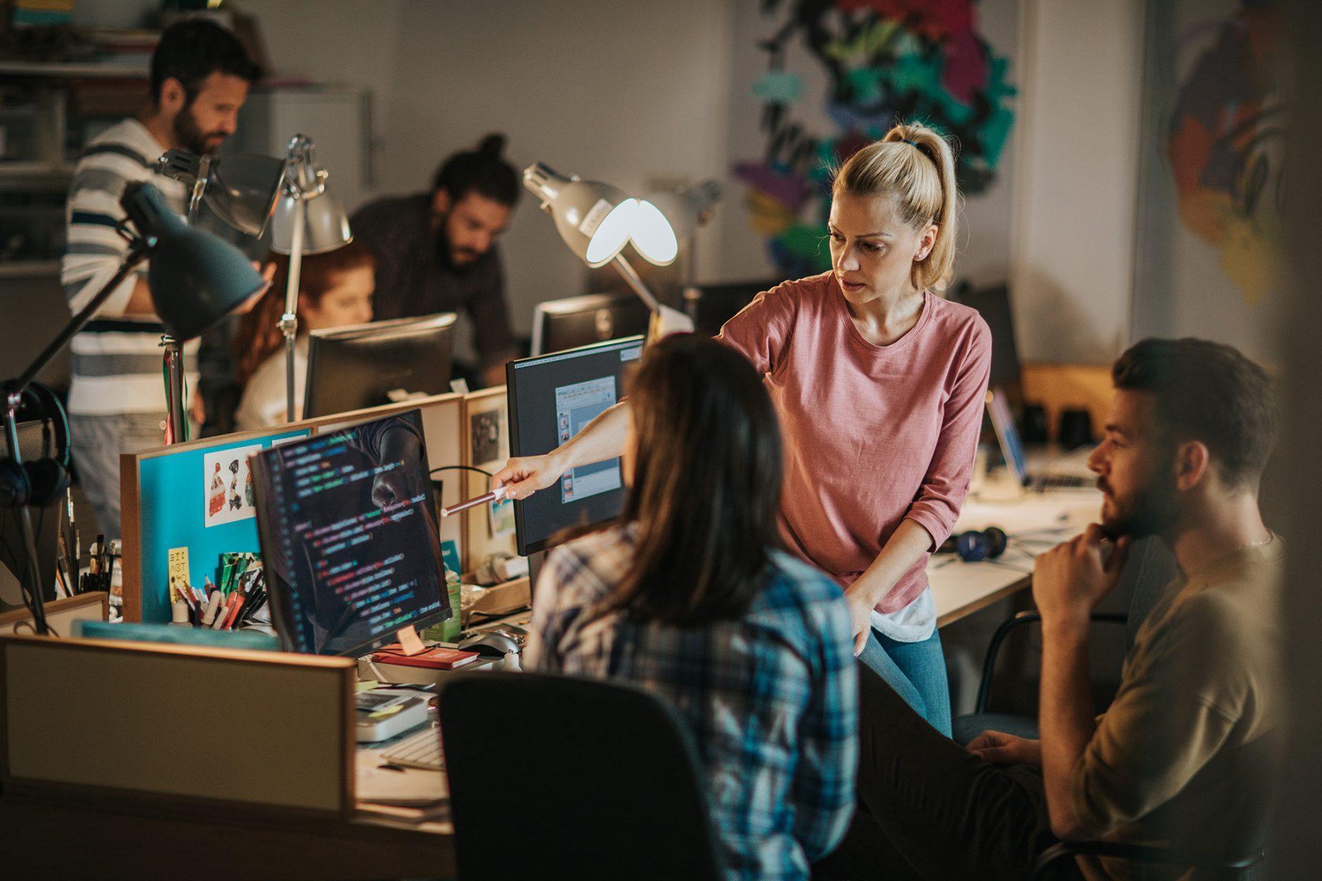 Seattle Software Developers project manager and developers collaborating